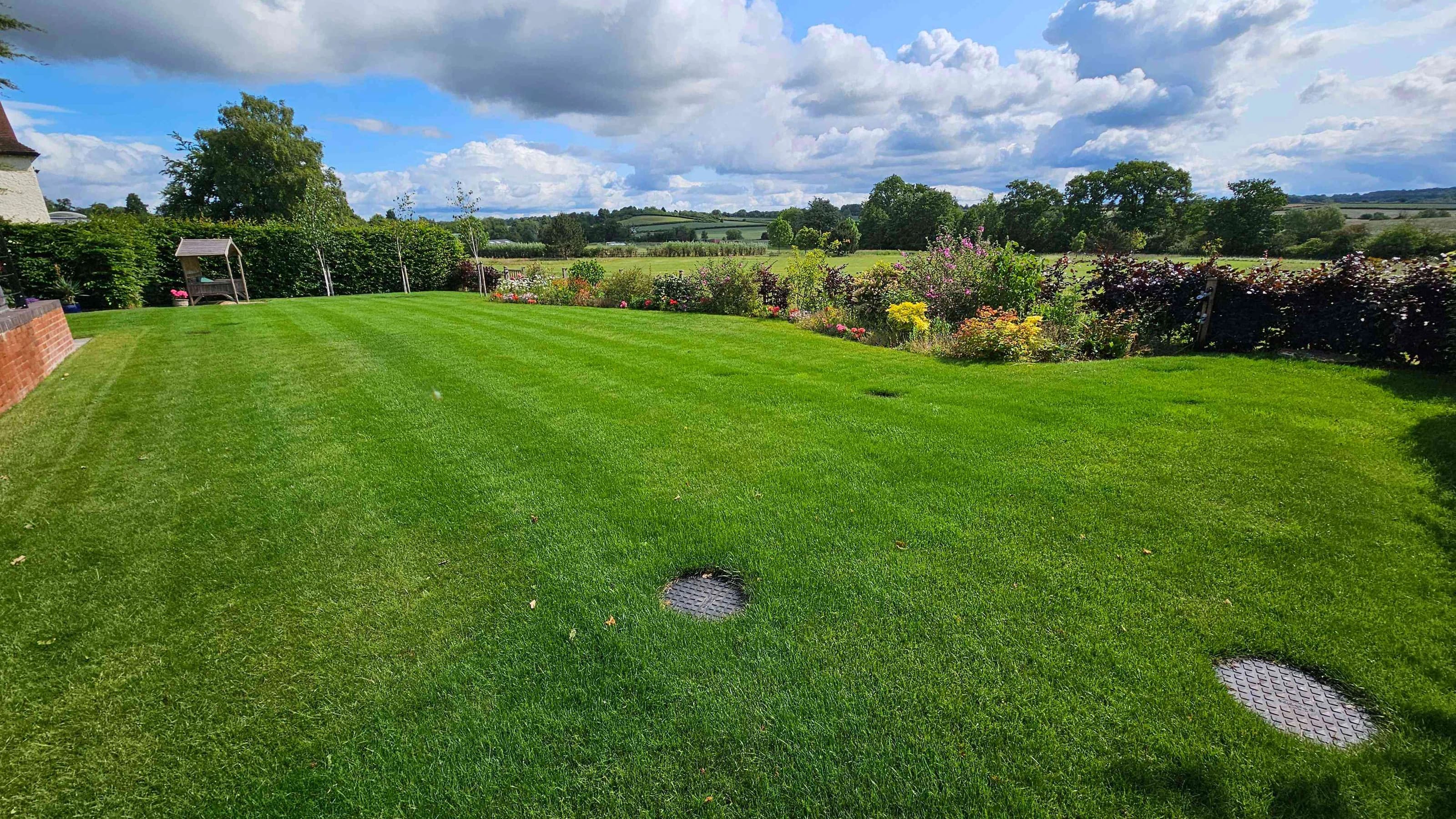 Image of well maintained, striped lawn